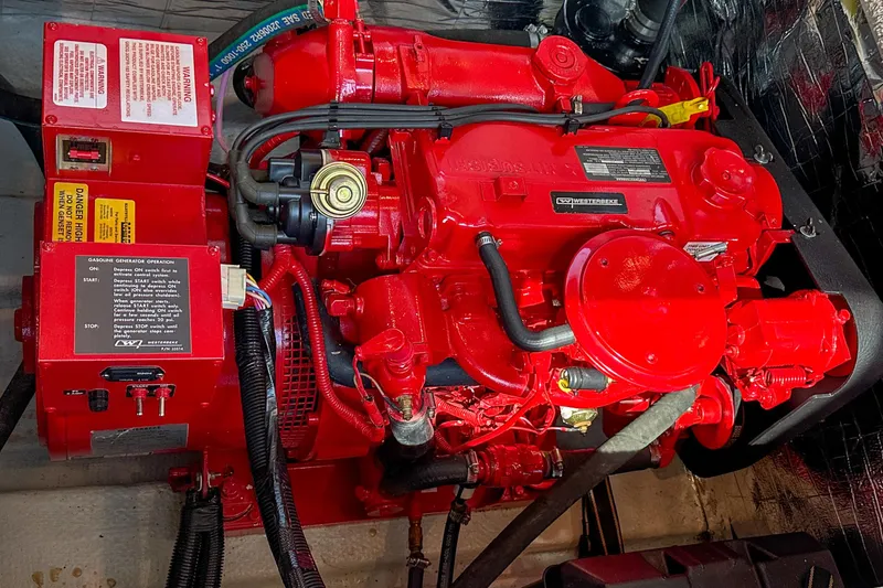 Slide: The Image of Red engine of a 2012 Bluewater 5200 Custom Series Yacht, detailed view. - 47