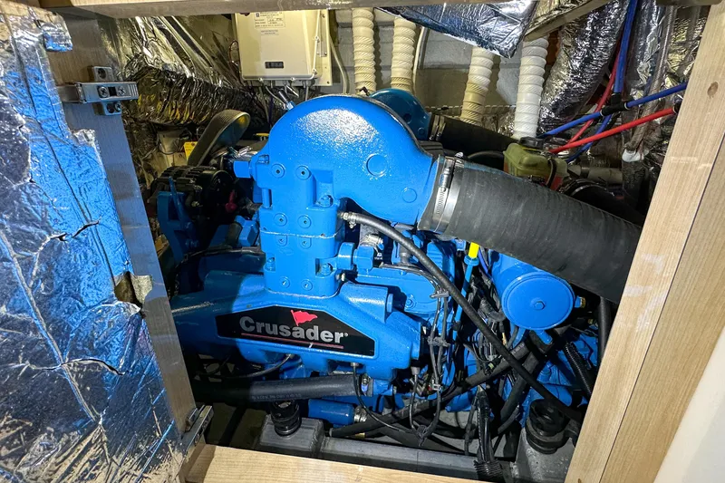 Slide: The Image of Engine room of 2012 Bluewater 5200 Custom Series Yacht with Crusader engine. - 48