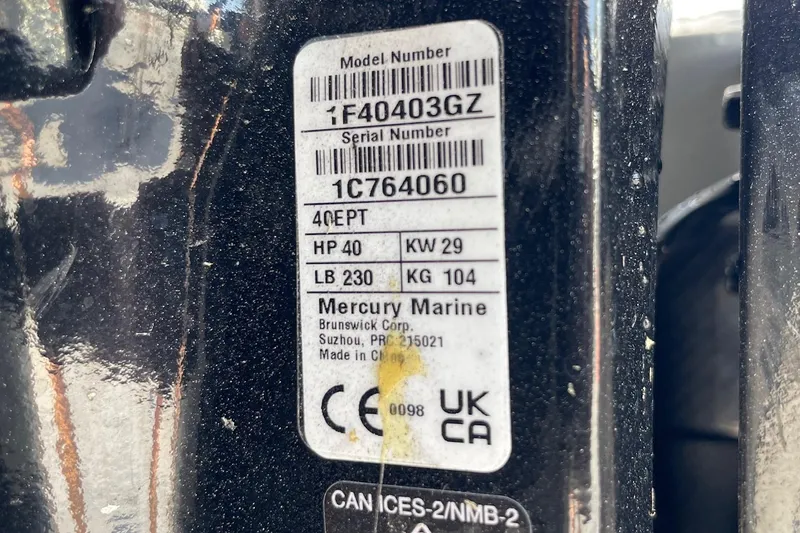 Slide: The Image of 2025 Chittum Skiffs Challenger 18 hull identification number on carbon fiber surface. - 14