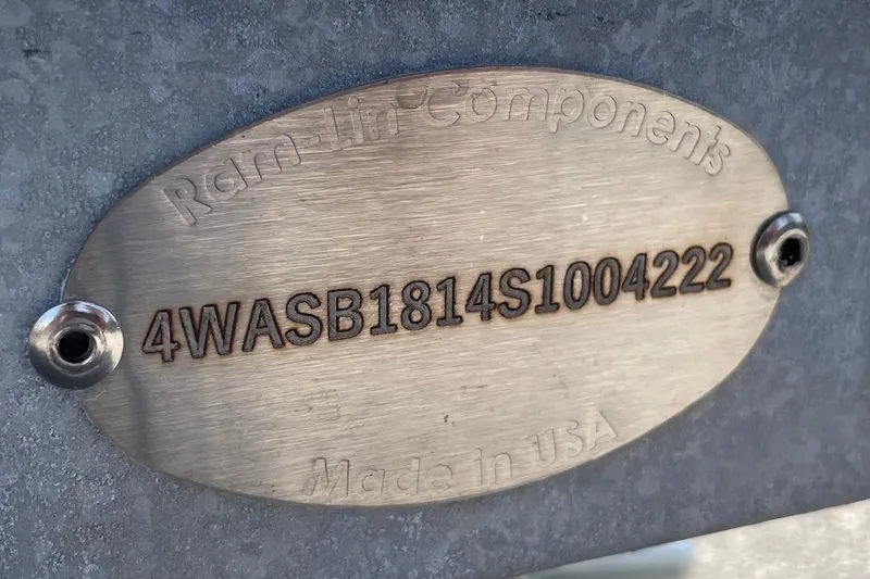 Slide: The Image of Metal plate with serial number on 2025 Chittum Skiffs Challenger 18 boat. - 17