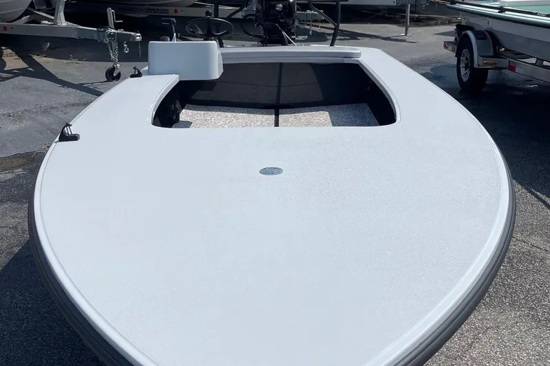Slide: The Image of 2025 Chittum Skiffs Challenger 18 boat on trailer in dealership lot. - 3