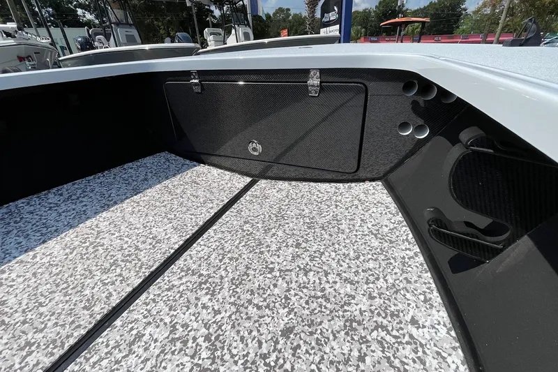 Slide: The Image of 2025 Chittum Skiffs Challenger 18 interior with steering wheel and control panel. - 8