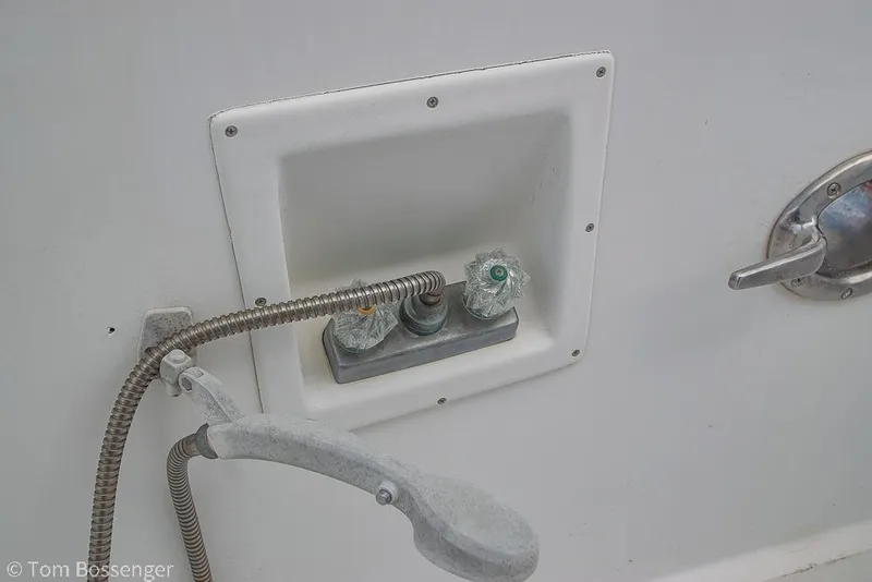 Slide: The Image of Outdoor shower controls on a 1986 Ponderosa 47 boat. - 59
