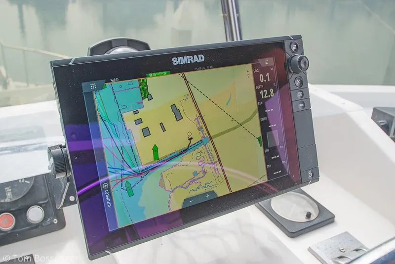 Slide: The Image of Simrad navigation display on 1986 Ponderosa 47 boat, showing nautical chart and data. - 79