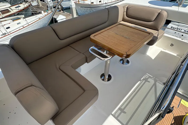 Slide: The Image of Luxurious seating area on 2017 Bavaria Virtess 420 Fly yacht with wooden table. - 13