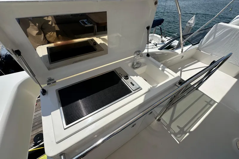 Slide: The Image of Outdoor kitchen on 2017 Bavaria Virtess 420 Fly yacht with sink and grill. - 14