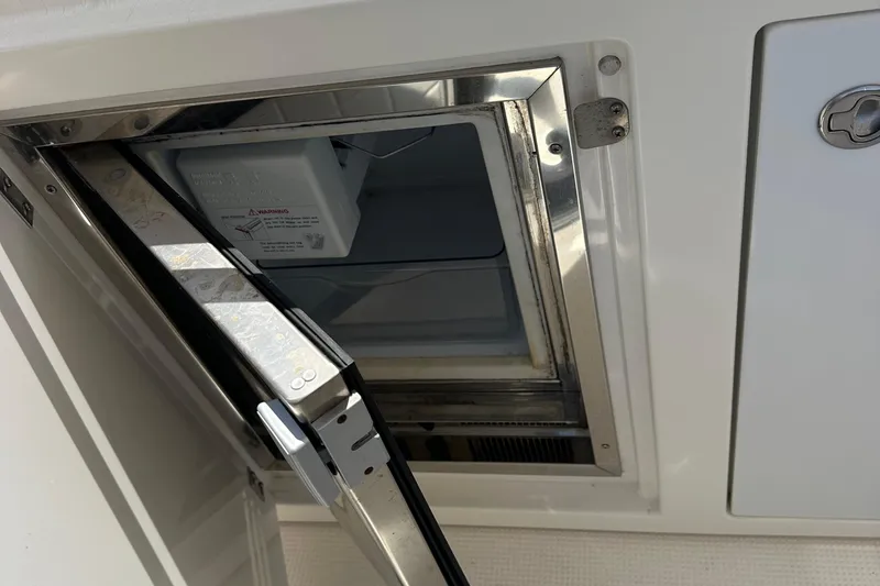 Slide: The Image of Open hatch on 2017 Bavaria Virtess 420 Fly yacht, revealing interior compartment. - 15