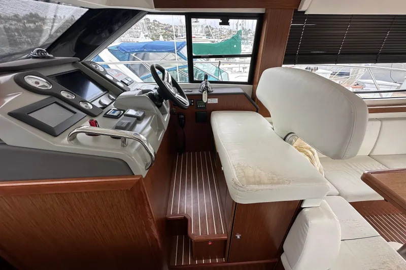 Slide: The Image of Helm station of 2017 Bavaria Virtess 420 Fly yacht with modern controls and seating. - 21