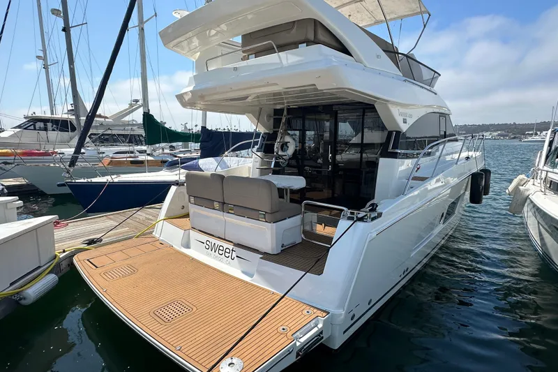 Slide: The Image of 2017 Bavaria Virtess 420 Fly yacht docked in marina, rear view. - 3