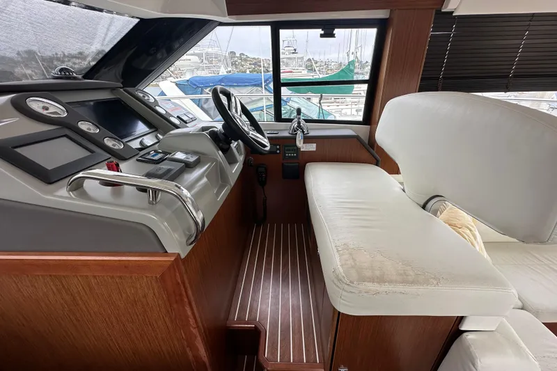 Slide: The Image of Cockpit of 2017 Bavaria Virtess 420 Fly yacht with modern controls and seating. - 30