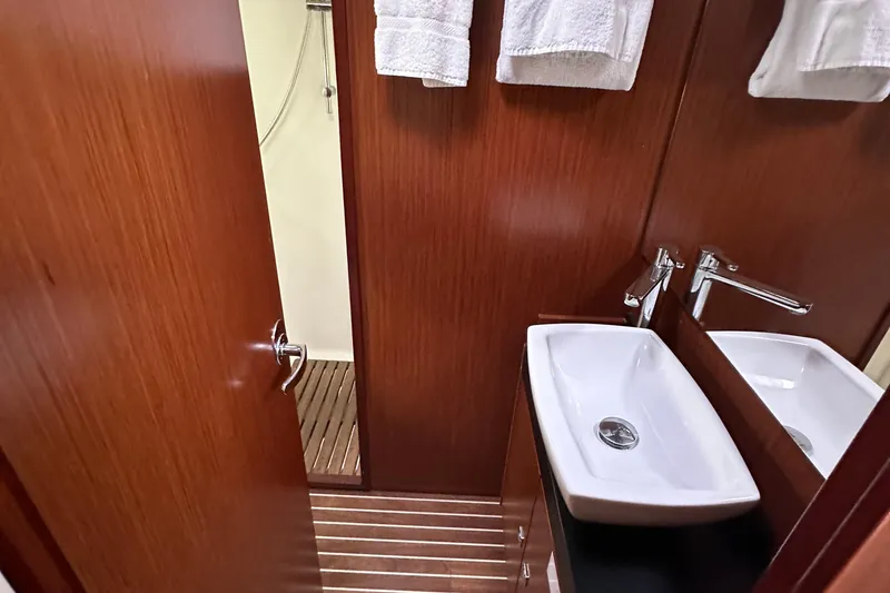 Slide: The Image of Luxurious bathroom interior of 2017 Bavaria Virtess 420 Fly yacht with wooden finish. - 32