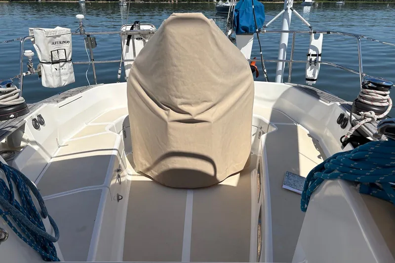 Slide: The Image of Tartan 4100 sailboat cockpit, 2005 model, with covered helm and nautical equipment. - 24