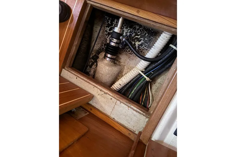 Slide: The Image of Boat interior showing Tartan 4100's wiring and plumbing components, 2005 model. - 52