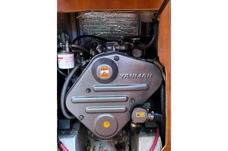 Slide: The Image of Yanmar engine in 2005 Tartan 4100 sailboat, showcasing detailed mechanical components. - 53