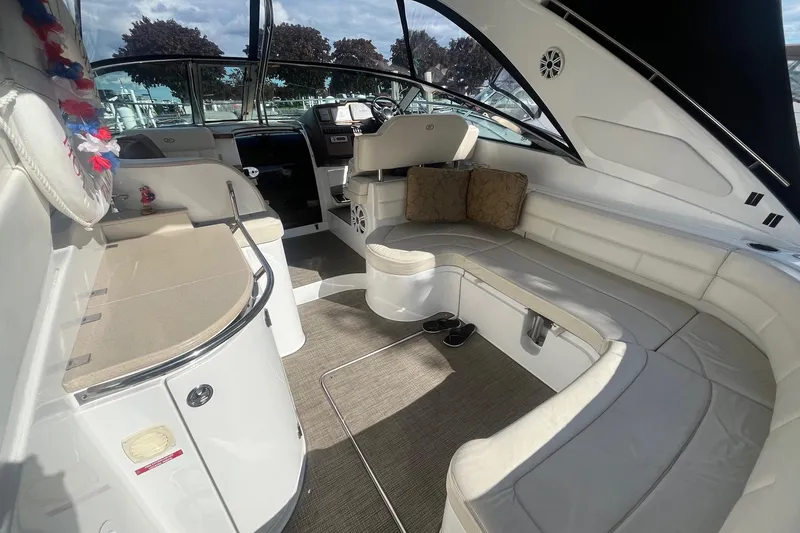 Slide: The Image of Luxurious interior of a 2009 Cobalt 373 boat with plush seating and modern amenities. - 12