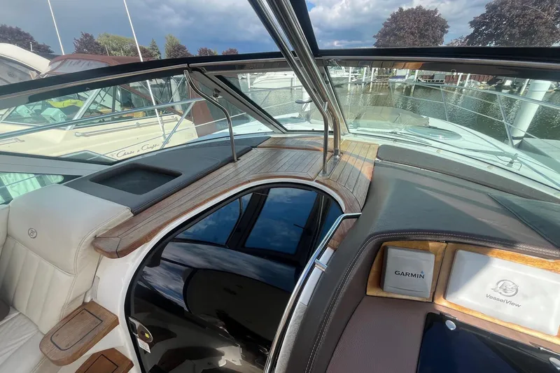 Slide: The Image of Interior view of a 2009 Cobalt 373 boat with Garmin and VesselView displays. - 19
