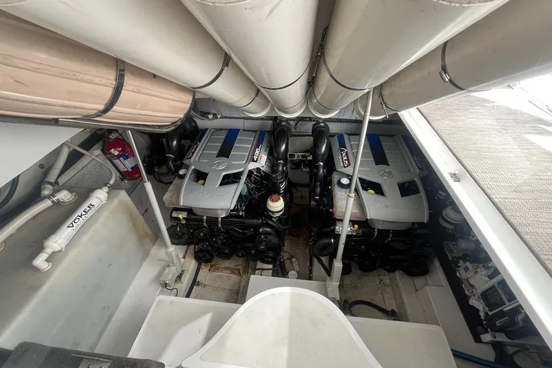 Slide: The Image of Engine compartment of a 2009 Cobalt 373 boat with twin MerCruiser engines. - 38