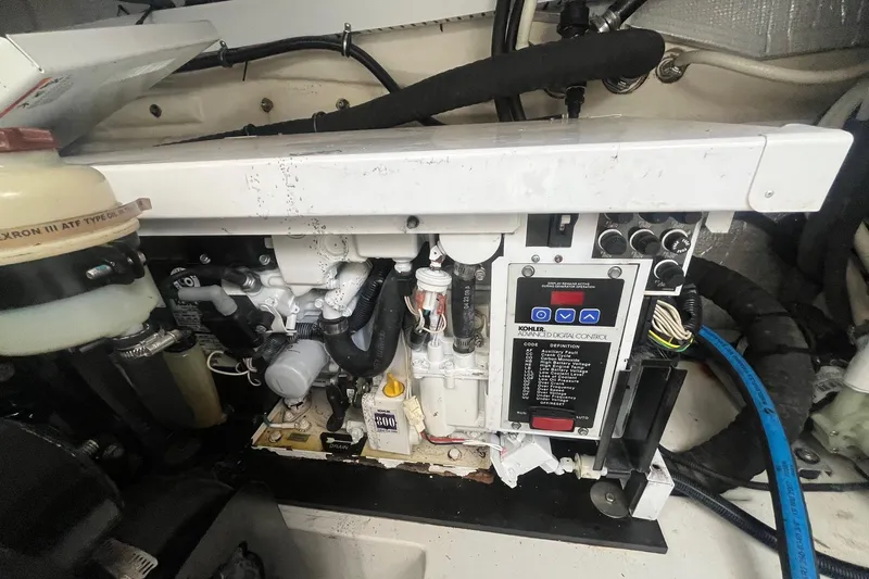 Slide: The Image of Engine compartment of a 2009 Cobalt 373 boat with Kohler digital control panel. - 39