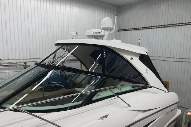 Slide: The Image of 2009 Cobalt 373 boat with Garmin equipment in a storage facility. - 4