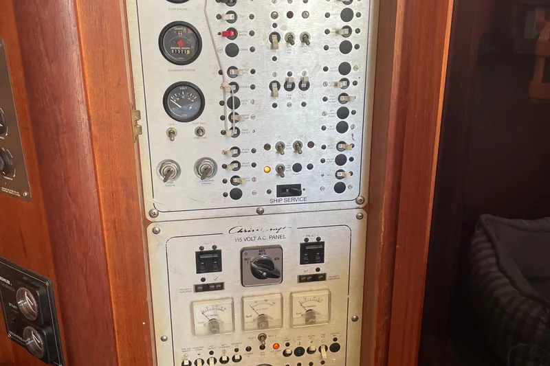 Slide: The Image of Electrical control panel of a 1987 Chris-Craft 392 Commander boat. - 33