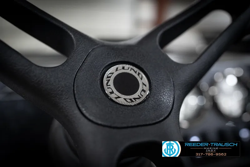 Slide: The Image of Close-up of 2026 Lund 1800 Explorer Sport steering wheel with logo. - 28