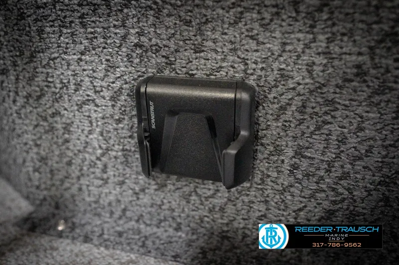 Slide: The Image of Black accessory mount on 2026 Lund 1800 Explorer Sport boat interior. - 30