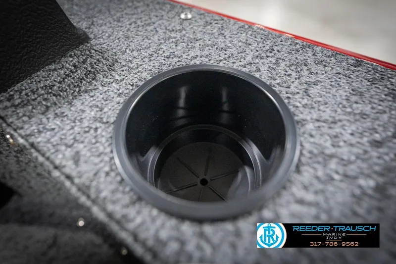 Slide: The Image of Cup holder on 2026 Lund 1800 Explorer Sport boat, textured surface, Reeder-Trausch Marine logo. - 37