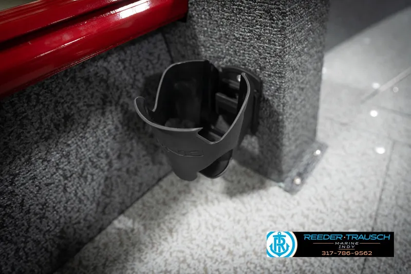 Slide: The Image of Cup holder in 2026 Lund 1800 Explorer Sport boat interior, Reeder-Trausch Marine logo visible. - 38