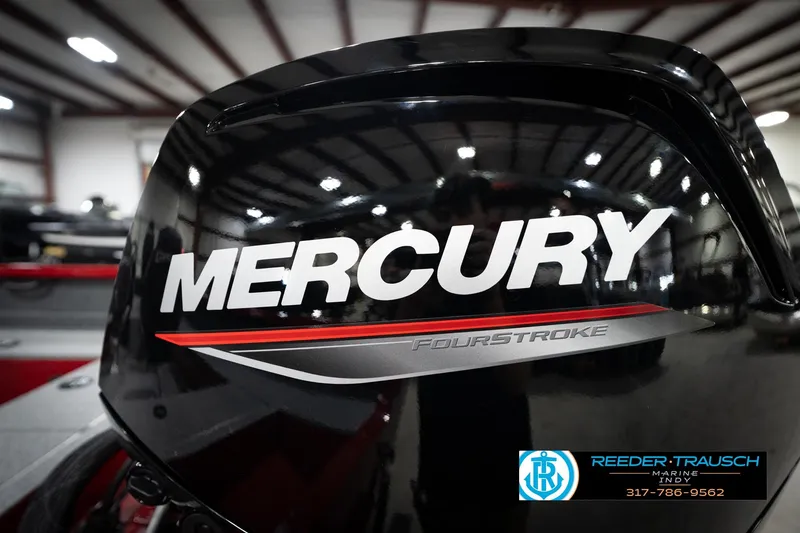 Slide: The Image of Mercury FourStroke engine on 2026 Lund 1800 Explorer Sport boat in showroom. - 41
