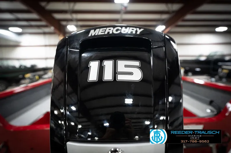 Slide: The Image of 2026 Lund 1800 Explorer Sport with Mercury 115 outboard engine in showroom. - 42