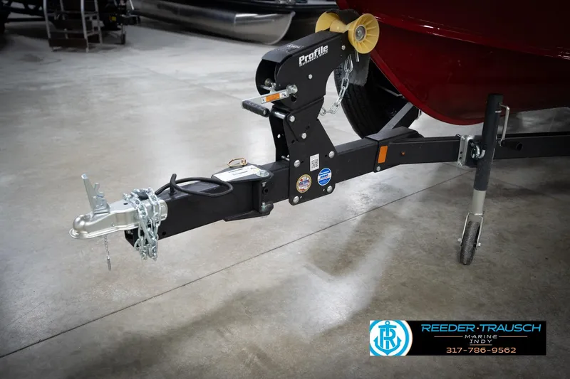 Slide: The Image of Trailer hitch of 2026 Lund 1800 Explorer Sport boat in a showroom. - 47