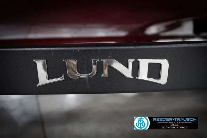 Slide: The Image of 2026 Lund 1800 Explorer Sport boat logo with Reeder Trausch Marine contact details. - 49
