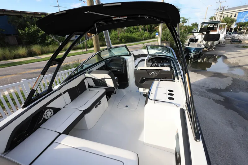 Slide: The Image of 2021 Monterey 275 Super Sport boat interior with sleek seating and modern design. - 14