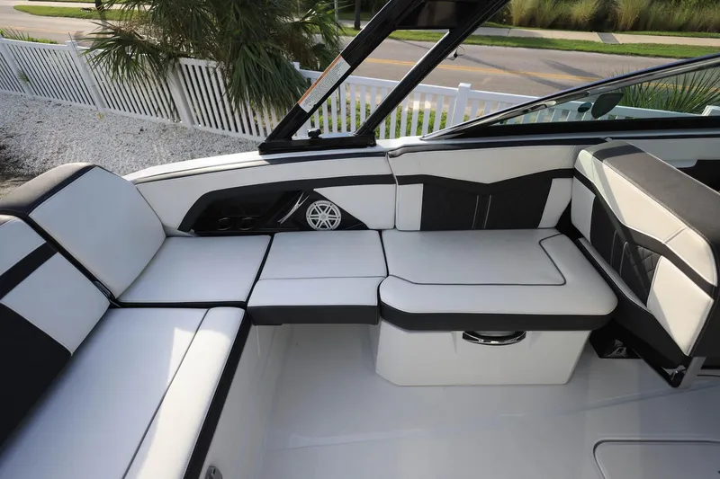 Slide: The Image of Luxurious seating area on a 2021 Monterey 275 Super Sport boat, featuring sleek design. - 17