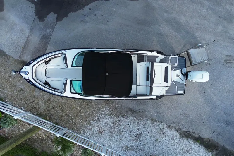 Slide: The Image of Overhead view of 2021 Monterey 275 Super Sport boat on a trailer. - 4