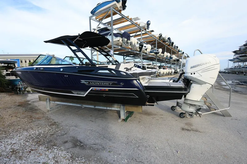 Slide: The Image of 2021 Monterey 275 Super Sport boat with Mercury outboard engine on display. - 7
