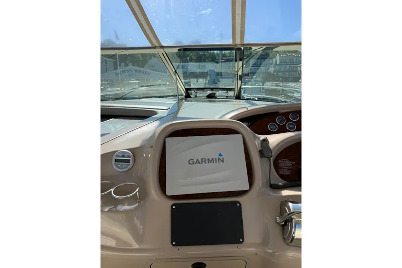 Slide: The Image of Cockpit of 2000 Sea Ray 410 Express Cruiser with Garmin navigation system. - 22