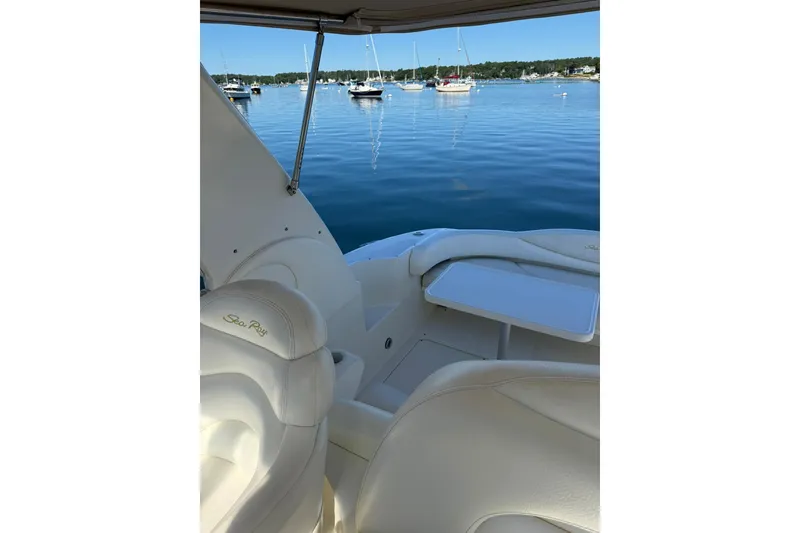 Slide: The Image of 2000 Sea Ray 410 Express Cruiser interior with scenic marina view. - 29