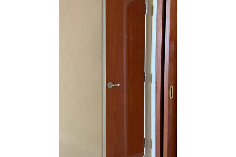 Slide: The Image of Wooden cabin door on 2000 Sea Ray 410 Express Cruiser yacht. - 70