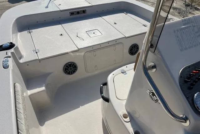 Slide: The Image of 2026 Carolina Skiff 19 LS boat interior with storage compartments and seating. - 6