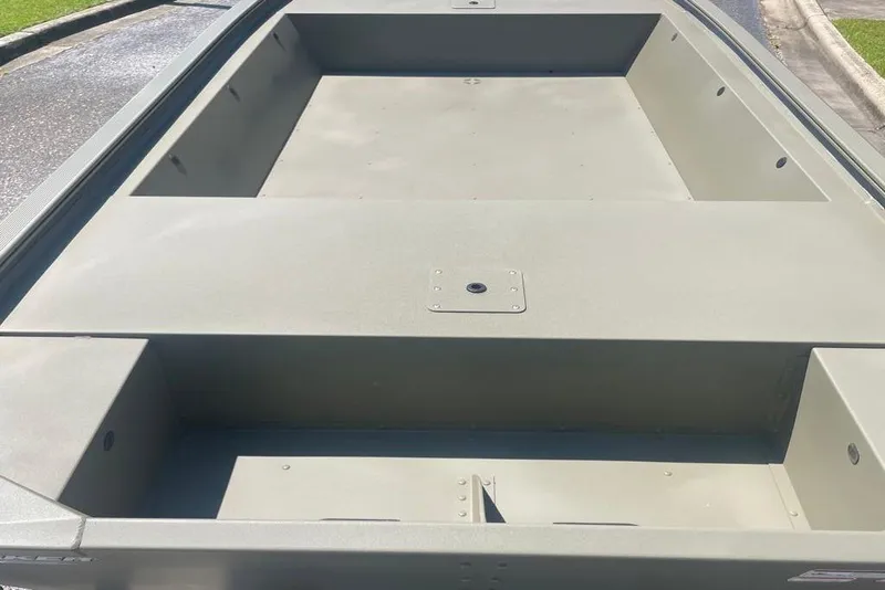 Slide: The Image of 2026 Tracker Grizzly 1648 Utility boat interior, showcasing spacious, durable design. - 5