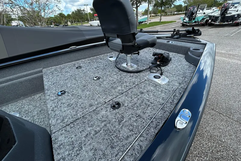 Slide: The Image of 2026 Tracker Pro Team 175 Crappie Edition boat deck with seating and fishing equipment. - 4