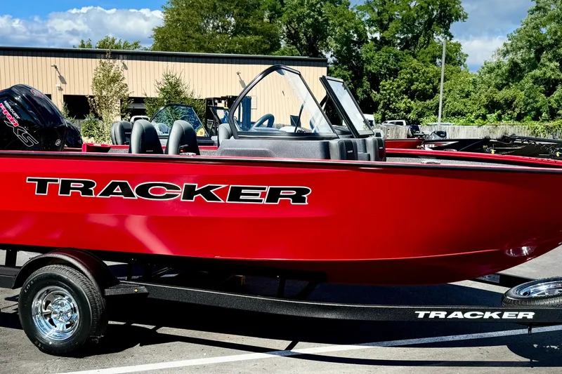 Slide: The Image of 2026 Tracker Pro Guide V-175 WT boat in vibrant red on a trailer. - 3