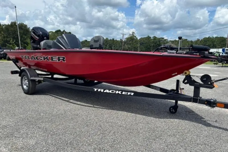 Slide: The Image of 2026 Tracker Pro Team 175 Crappie Edition boat on trailer, red exterior, parked outdoors. - 3