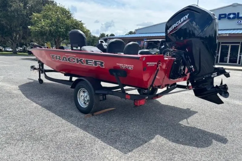 Slide: The Image of 2026 Tracker Pro Team 175 Crappie Edition boat with Mercury engine on trailer. - 7