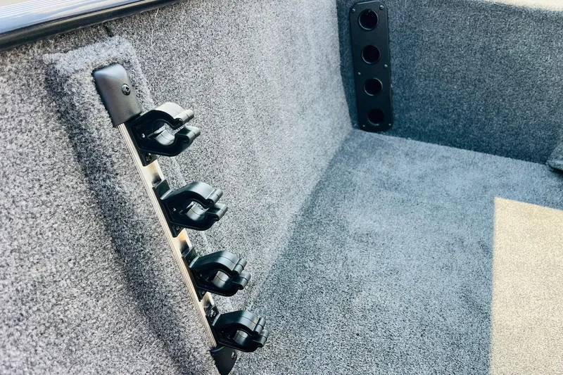 Slide: The Image of Interior of 2026 Tracker Bass Tracker Classic XL boat with rod holders. - 14