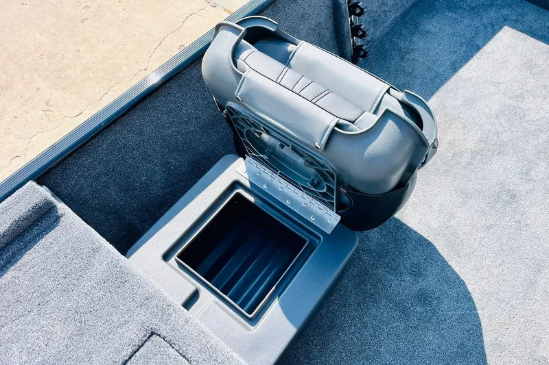 Slide: The Image of 2026 Tracker Bass Tracker Classic XL boat seat and storage compartment. - 19
