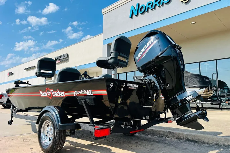 Slide: The Image of 2026 Tracker Bass Tracker Classic XL boat with Mercury engine at dealership. - 6