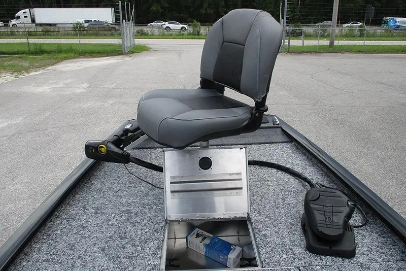 Slide: The Image of 2026 Tracker Pro 170 boat interior with a swivel seat and control panel. - 11