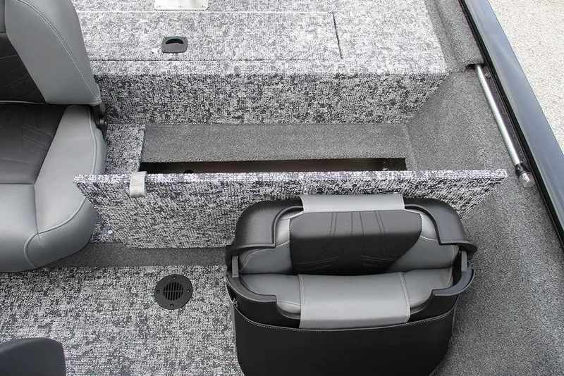 Slide: The Image of 2026 Tracker Pro 170 boat interior with storage compartment and seating. - 18